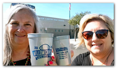 Photo of Suzi and Kamie showing community support items.